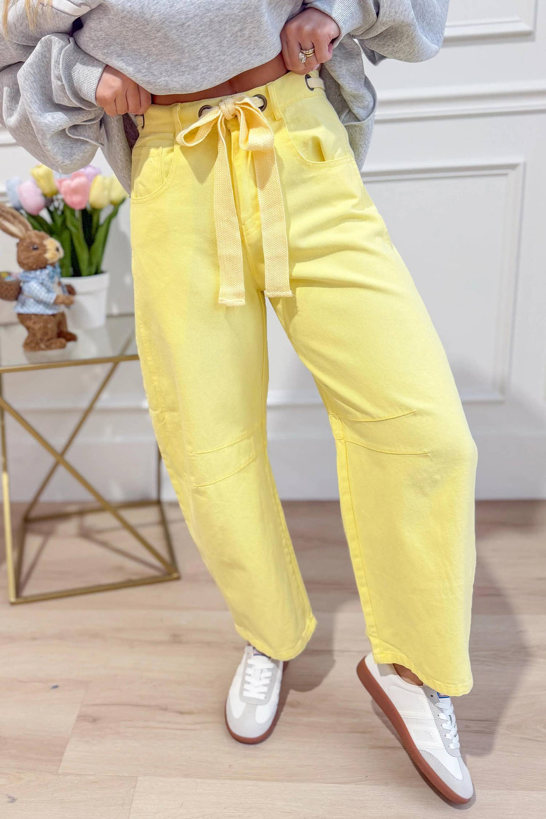 Front view of yellow washed eyelet barrel pants — Heritage 1823 boutique in Dublin, TX.